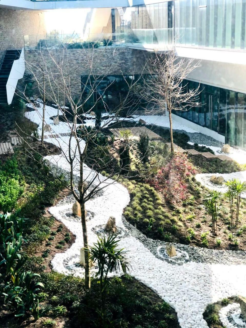 Royal Obidos Scenic Resort Praia del Rei Extérieur photo The waterfall at the entrance of the building